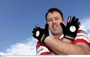 5 March 2003; Cork and Nemo Rangers footballer Colin Corkery with the new Uhlsport gaelic football gloves that he helped design. Football. Picture credit; Brendan Moran / SPORTSFILE *EDI*