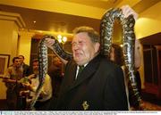 9 October 2003; Ireland baggage master Paddy &quot; Rala &quot; O'Reilly, with a snake from the local reptile park, before a function where the players were presented with their World Cup caps at a Welcome Reception held by the Gosford City Council. 2003 Rugby World Cup, Welcome Reception, Crowne Plaza Hotel, Terrigal, New South Wales, Australia. Picture credit; Brendan Moran / SPORTSFILE *EDI*
