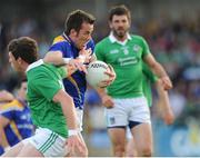 29 June 2013; Michael Brady, Longford, in action against Bobby O'Brien, Limerick. GAA Football All Ireland Senior Championship, Round 1, Longford v Limerick, Pearse Park, Longford. Picture credit: Ray Lohan / SPORTSFILE