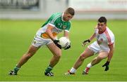 29 June 2013; Paul McConway, Offaly, in action against Darren McCurry, Tyrone. GAA Football All-Ireland Senior Championship, Round 1, Offaly v Tyrone, O'Connor Park, Tullamore, Co. Offaly. Picture credit: David Maher / SPORTSFILE