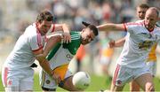 29 June 2013; Conor McAliskey, left and Danny McBride, Tyrone, in action against Ken Casey, Offaly. GAA Football All-Ireland Senior Championship, Round 1, Offaly v Tyrone, O'Connor Park, Tullamore, Co. Offaly. Picture credit: David Maher / SPORTSFILE