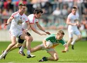 29 June 2013; Ciaran Hurley, Offaly, in action against Ciaran McGinley, left, and Matthew Donnelly, Tyrone. GAA Football All-Ireland Senior Championship, Round 1, Offaly v Tyrone, O'Connor Park, Tullamore, Co. Offaly. Picture credit: David Maher / SPORTSFILE