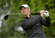 30 June 2013; Paul Casey, England, watches his shot from the 2nd tee box during the Irish Open Golf Championship 2013. Carton House, Maynooth, Co. Kildare. Picture credit: Matt Browne / SPORTSFILE