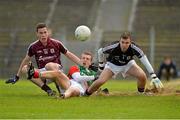 30 June 2013; Michael Plunkett, Mayo, in action against Dylan Corbett, left, and goalkeeper James Healy, Galway. Electric Ireland Connacht GAA Football Minor Championship, Semi-Final, Galway v Mayo, Hyde Park, Roscommon. Picture credit: Barry Cregg / SPORTSFILE