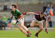 30 June 2013; Val Roughneen, Mayo, in action against Cathal Reilly, Galway. Electric Ireland Connacht GAA Football Minor Championship, Semi-Final, Galway v Mayo, Hyde Park, Roscommon. Picture credit: Barry Cregg / SPORTSFILE