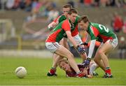 30 June 2013; Colm Mannion, Galway, in action against David Kenny, left, Stephen Coen and Conor Byrne, Mayo. Electric Ireland Connacht GAA Football Minor Championship, Semi-Final, Galway v Mayo, Hyde Park, Roscommon. Picture credit: Barry Cregg / SPORTSFILE