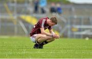 30 June 2013; A dejected Cormac Raferty, Galway, at the end of the game. Electric Ireland Connacht GAA Football Minor Championship, Semi-Final, Galway v Mayo, Hyde Park, Roscommon. Picture credit: Barry Cregg / SPORTSFILE