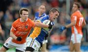 30 June 2013; Damian Power, Wicklow, in action against Tony Kernan, Armagh. GAA Football All-Ireland Senior Championship, Round 1, Armagh v Wicklow, Athletic Grounds, Armagh. Picture credit: Brendan Moran / SPORTSFILE