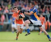 30 June 2013; Jamie Clarke, Armagh, in action against Damian Power, Wicklow. GAA Football All-Ireland Senior Championship, Round 1, Armagh v Wicklow, Athletic Grounds, Armagh. Picture credit: Brendan Moran / SPORTSFILE
