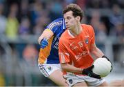 30 June 2013; Jamie Clarke, Armagh, in action against Dean Healy, Wicklow. GAA Football All-Ireland Senior Championship, Round 1, Armagh v Wicklow, Athletic Grounds, Armagh. Picture credit: Brendan Moran / SPORTSFILE