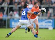 30 June 2013; Eugene McVerry, Armagh, in action against Alan Byrne, Wicklow. GAA Football All-Ireland Senior Championship, Round 1, Armagh v Wicklow, Athletic Grounds, Armagh. Picture credit: Brendan Moran / SPORTSFILE