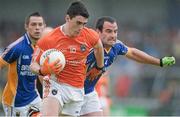30 June 2013; Caolan Rafferty, Armagh, in action against Alan Byrne, Wicklow. GAA Football All-Ireland Senior Championship, Round 1, Armagh v Wicklow, Athletic Grounds, Armagh. Picture credit: Brendan Moran / SPORTSFILE
