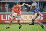 30 June 2013; Jamie Clarke, Armagh, in action against Rory Finn, Wicklow. GAA Football All-Ireland Senior Championship, Round 1, Armagh v Wicklow, Athletic Grounds, Armagh. Picture credit: Brendan Moran / SPORTSFILE