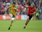 23 June 2013; Rory Kavanagh, Donegal, in action against Ambrose Rogers, Down. Ulster GAA Football Senior Championship Semi-Final, Donegal v Down, Kingspan Breffni Park, Cavan. Picture credit: Brian Lawless / SPORTSFILE