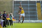 29 June 2013; Lee Chin, Wexford, jumps to keep the ball in play. GAA Hurling All-Ireland Senior Championship, Phase I, Wexford v Carlow, Wexford Park, Wexford. Picture credit: Matt Browne / SPORTSFILE