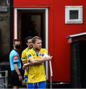 24 July 2020; Longford Town captain Dean Zambra puts on the captains armband after leaving the dressing room ahead of the club friendly match between Bohemians and Longford Town at Dalymount Park in Dublin. Soccer matches continue to take place in front of a limited number of people in an effort to contain the spread of the coronavirus (Covid-19) pandemic. Photo by Ramsey Cardy/Sportsfile