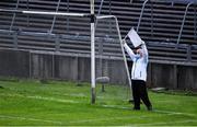 24 July 2020; Umpire John Hurley, wearing a mask, waves the white flag for a point for Na Piarsaigh during the Limerick County Senior Hurling Championship Round 1 match between Kilmallock and Na Piarsaigh at LIT Gaelic Grounds in Limerick. GAA matches continue to take place in front of a limited number of people in an effort to contain the spread of the coronavirus (Covid-19) pandemic. Photo by Piaras Ó Mídheach/Sportsfile