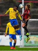 24 July 2020; Lido Lotefa of Longford Town in action against Kris Twardek of Bohemians during the club friendly match between Bohemians and Longford Town at Dalymount Park in Dublin. Soccer matches continue to take place in front of a limited number of people in an effort to contain the spread of the coronavirus (Covid-19) pandemic. Photo by Ramsey Cardy/Sportsfile