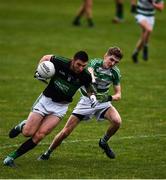 24 July 2020; Luke Connolly of Nemo Rangers in action against Rory O'Sullivan of Valley Rangers during the Cork County Premier Senior Football Championship Group C Round 1 match between Valley Rovers and Nemo Rangers at Cloughduv GAA grounds in Cloughduv, Cork. GAA matches continue to take place in front of a limited number of people in an effort to contain the spread of the coronavirus (Covid-19) pandemic. Photo by David Fitzgerald/Sportsfile