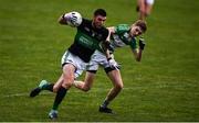 24 July 2020; Luke Connolly of Nemo Rangers in action against Rory O'Sullivan of Valley Rangers during the Cork County Premier Senior Football Championship Group C Round 1 match between Valley Rovers and Nemo Rangers at Cloughduv GAA grounds in Cloughduv, Cork. GAA matches continue to take place in front of a limited number of people in an effort to contain the spread of the coronavirus (Covid-19) pandemic. Photo by David Fitzgerald/Sportsfile