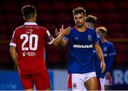 24 July 2020; Matthew Clarke of Linfield shakes hands with Aaron Dobbs of Shelbourne following the club friendly match between Shelbourne and Linfield at Tolka Park in Dublin. Soccer matches continue to take place in front of a limited number of people in an effort to contain the spread of the coronavirus (Covid-19) pandemic. Photo by Harry Murphy/Sportsfile