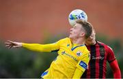 24 July 2020; James English of Longford Town in action against Anto Breslin of Bohemians during the club friendly match between Bohemians and Longford Town at Dalymount Park in Dublin. Soccer matches continue to take place in front of a limited number of people in an effort to contain the spread of the coronavirus (Covid-19) pandemic. Photo by Ramsey Cardy/Sportsfile