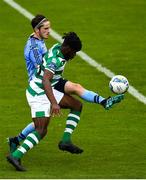 25 July 2020; Thomas Oluwa of Shamrock Rovers in action against Evan Farrell of UCD during the club friendly between Shamrock Rovers and UCD at Tallaght Stadium in Dublin. Soccer matches continue to take place in front of a limited number of people in an effort to contain the spread of the Coronavirus (COVID-19) pandemic. Photo by Eóin Noonan/Sportsfile