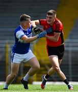 25 July 2020; Sean O'Shea of Kenmare Shamrocks attempts to escape the attentions of Karl Mullins of Kerins O'Rahillys during the Kerry County Senior Club Football Championship Group 1 Round 1 match between Kenmare Shamrocks and Kerins O'Rahillys at Fitzgerald Stadium in Killarney, Kerry. GAA matches continue to take place in front of a limited number of people in an effort to contain the spread of the Coronavirus (COVID-19) pandemic. Photo by Brendan Moran/Sportsfile