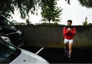 25 July 2020; Chris Barrett of Clontarf stretches in the car park prior to the Dublin County Senior Football Championship Round 1 match between Ballyboden St Endas and Clontarf at Pairc Uí Mhurchu in Dublin. GAA matches continue to take place in front of a limited number of people in an effort to contain the spread of the Coronavirus (COVID-19) pandemic. Photo by David Fitzgerald/Sportsfile