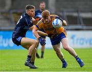 25 July 2020; Conor McHugh of Na Fianna in action against Jack McGuire of St Jude during the Dublin County Senior Football Championship Round 1 match between St Judes and Na Fianna at Parnell Park in Dublin. GAA matches continue to take place in front of a limited number of people in an effort to contain the spread of the Coronavirus (COVID-19) pandemic. Photo by Matt Browne/Sportsfile