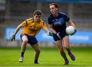 25 July 2020; Alex Hassett of St Judes in action against Brian O'Leary of Na Fianna during the Dublin County Senior Football Championship Round 1 match between St Judes and Na Fianna at Parnell Park in Dublin. GAA matches continue to take place in front of a limited number of people in an effort to contain the spread of the Coronavirus (COVID-19) pandemic. Photo by Matt Browne/Sportsfile