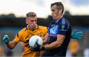 25 July 2020; Niall Coakley of St Judes in action against Jonny Cooper of Na Fianna during the Dublin County Senior Football Championship Round 1 match between St Judes and Na Fianna at Parnell Park in Dublin. GAA matches continue to take place in front of a limited number of people in an effort to contain the spread of the Coronavirus (COVID-19) pandemic. Photo by Matt Browne/Sportsfile