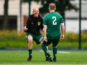 26 July 2020; Graham Curran of Usher Celtic, 2, celebrates after scoring his side's first goal with Usher Celtic manager Wesley Doyle during the FAI New Balance Junior Cup Quarter-Final match between Usher Celtic and Gorey Rangers at Grangegorman IT in Dublin. Competitive Soccer matches have been approved to return following the guidelines of Phase 3 of the Irish Government’s Roadmap for Reopening of Society and Business and protocols set down by the Soccer governing authorities. With games having been suspended since March, competitive games can take place with updated protocols including a limit of 200 individuals at any one outdoor event, including players, officials and a limited number of spectators, with social distancing, hand sanitisation and face masks being worn by those in attendance among other measures in an effort to contain the spread of the Coronavirus (COVID-19). Photo by Sam Barnes/Sportsfile