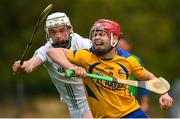 26 July 2020; Ronan O'Meara of Portumna in action against Evan Cox of Sarsfields during the Galway County Senior Club Hurling Championship Group 3 Round 1 match between Sarsfields and Portumna at Kenny Park in Athenry, Galway. GAA matches continue to take place in front of a limited number of people in an effort to contain the spread of the Coronavirus (COVID-19) pandemic. Photo by David Fitzgerald/Sportsfile