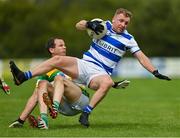 26 July 2020; Michael Hurley of Castlehaven is tackled by Alan Jennings of Carbery Rangers during the Cork County Premier Senior Football Championship Group B Round 1 match between Castlehaven and Carbery Rangers Clonakilty in Cork. GAA matches continue to take place in front of a limited number of people in an effort to contain the spread of the Coronavirus (COVID-19) pandemic. Photo by Brendan Moran/Sportsfile