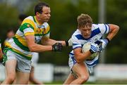 26 July 2020; David Whelton of Castlehaven is tackled by Alan Jennings of Carbery Rangers during the Cork County Premier Senior Football Championship Group B Round 1 match between Castlehaven and Carbery Rangers Clonakilty in Cork. GAA matches continue to take place in front of a limited number of people in an effort to contain the spread of the Coronavirus (COVID-19) pandemic. Photo by Brendan Moran/Sportsfile