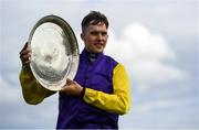 27 July 2020; Finny Maguire poses with the shield after riding Princess Zoe to win the Connacht Hotel (Q.R.) Handicap on day one of the Galway Summer Racing Festival at Ballybrit Racecourse in Galway. Horse racing remains behind closed doors to the public under guidelines of the Irish Government in an effort to contain the spread of the Coronavirus (COVID-19) pandemic. Photo by Harry Murphy/Sportsfile