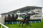 29 July 2020; A general view as runners and riders jump the fourth fence during the Irish Stallion Farms EBF Mares Handicap Hurdle on day three of the Galway Summer Racing Festival at Ballybrit Racecourse in Galway. Horse racing remains behind closed doors to the public under guidelines of the Irish Government in an effort to contain the spread of the Coronavirus (COVID-19) pandemic.  Photo by Harry Murphy/Sportsfile