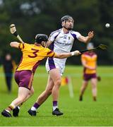 29 July 2020; Ronan O'hAodha of Kilmacud Crokes in action against Eugene Farrell of Craobh Chiarain during the Dublin County Senior Hurling Championship Group 2 Round 2 match between Craobh Chiarain and Kilmacud Crokes at Craobh Chiarans Pitch in Clonshaugh, Dublin. GAA matches continue to take place in front of a limited number of people in an effort to contain the spread of the Coronavirus (COVID-19) pandemic.  Photo by Eóin Noonan/Sportsfile
