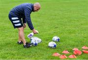 30 July 2020; Coach Niall Kane sanitises rugby balls before a Leinster U18 Girls Squad Training session at Cill Dara RFC in Kildare. during a Leinster U18 Girls Squad Training session at Cill Dara RFC in Kildare. Photo by Piaras Ó Mídheach/Sportsfile