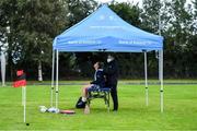 30 July 2020; Danielle Loughnane is treated by physio Lee Van Haeften during a Leinster U18 Girls Squad Training session at Cill Dara RFC in Kildare. Photo by Piaras Ó Mídheach/Sportsfile