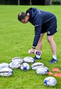 30 July 2020; Coach Damien McCabe sanitises rugby balls before a Leinster U18 Girls Squad Training session at Cill Dara RFC in Kildare. Photo by Piaras Ó Mídheach/Sportsfile