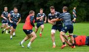 30 July 2020; Ryan Baird is tackled by Scott Penny during Leinster Rugby squad training at UCD in Dublin. Professional rugby continues its return in a phased manner, having been suspended since March due to the Irish Government's efforts to contain the spread of the Coronavirus (COVID-19) pandemic. Having had zero positive results from the latest round of PCR testing, the Leinster Rugby players and staff have been cleared to enter the next phase of their return to rugby today which includes a graduated return to contact training. Photo by Conor Sharkey for Leinster Rugby via Sportsfile