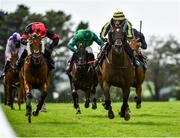 30 July 2020; Guinevere, with Simon Torrens up, right, lead Politicise, with Darragh O'Keeffe up, on their way to winning the Guinness Novice Hurdle on day four of the Galway Summer Racing Festival at Ballybrit Racecourse in Galway. Horse racing remains behind closed doors to the public under guidelines of the Irish Government in an effort to contain the spread of the Coronavirus (COVID-19) pandemic. Photo by Harry Murphy/Sportsfile