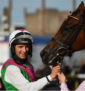 30 July 2020; Jockey Patrick Mullins celebrates with Aramon after victory in the Guinness Galway Hurdle Handicap on day four of the Galway Summer Racing Festival at Ballybrit Racecourse in Galway. Horse racing remains behind closed doors to the public under guidelines of the Irish Government in an effort to contain the spread of the Coronavirus (COVID-19) pandemic. Photo by Harry Murphy/Sportsfile