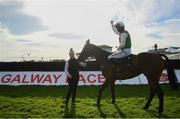 30 July 2020; Jockey Patrick Mullins celebrates with handler Rachel Boyd after victory in the Guinness Galway Hurdle Handicap on Aramon during day four of the Galway Summer Racing Festival at Ballybrit Racecourse in Galway. Horse racing remains behind closed doors to the public under guidelines of the Irish Government in an effort to contain the spread of the Coronavirus (COVID-19) pandemic. Photo by Harry Murphy/Sportsfile