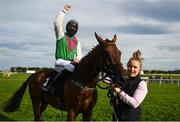 30 July 2020; Jockey Patrick Mullins celebrates with handler Rachel Boyd after victory in the Guinness Galway Hurdle Handicap on Aramon during day four of the Galway Summer Racing Festival at Ballybrit Racecourse in Galway. Horse racing remains behind closed doors to the public under guidelines of the Irish Government in an effort to contain the spread of the Coronavirus (COVID-19) pandemic. Photo by Harry Murphy/Sportsfile