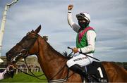 30 July 2020; Jockey Patrick Mullins celebrates with handler Rachel Boyd after victory in the Guinness Galway Hurdle Handicap on Aramon during day four of the Galway Summer Racing Festival at Ballybrit Racecourse in Galway. Horse racing remains behind closed doors to the public under guidelines of the Irish Government in an effort to contain the spread of the Coronavirus (COVID-19) pandemic. Photo by Harry Murphy/Sportsfile