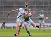 31 July 2020; Martin Keoghan of Tullaroan in action against Ronan Corcoran of Ballyhale Shamrocks during the Kilkenny County Senior Hurling League Group A match between Ballyhale Shamrocks and Tullaroan at UPMC Nowlan Park in Kilkenny. GAA matches continue to take place in front of a limited number of people in an effort to contain the spread of the Coronavirus (COVID-19) pandemic. Photo by Matt Browne/Sportsfile