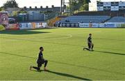 31 July 2020; David Titov of St Patrick's Athletic, left, takes a knee in support of the Black Lives Matter movement prior to the SSE Airtricity League Premier Division match between Dundalk and St Patrick's Athletic at Oriel Park in Dundalk, Louth. The SSE Airtricity League Premier Division made its return today after 146 days in lockdown but behind closed doors due to the ongoing Coronavirus restrictions. Photo by Piaras Ó Mídheach/Sportsfile